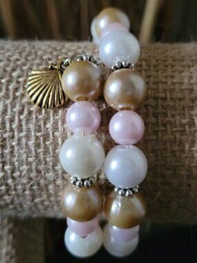 Elegant and Tasteful Champagne White Pink Beaded Wrist Wraps with Gold Charms